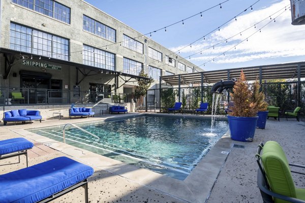 Rooftop pool with city skyline view at Mitchell Lofts, luxury apartments