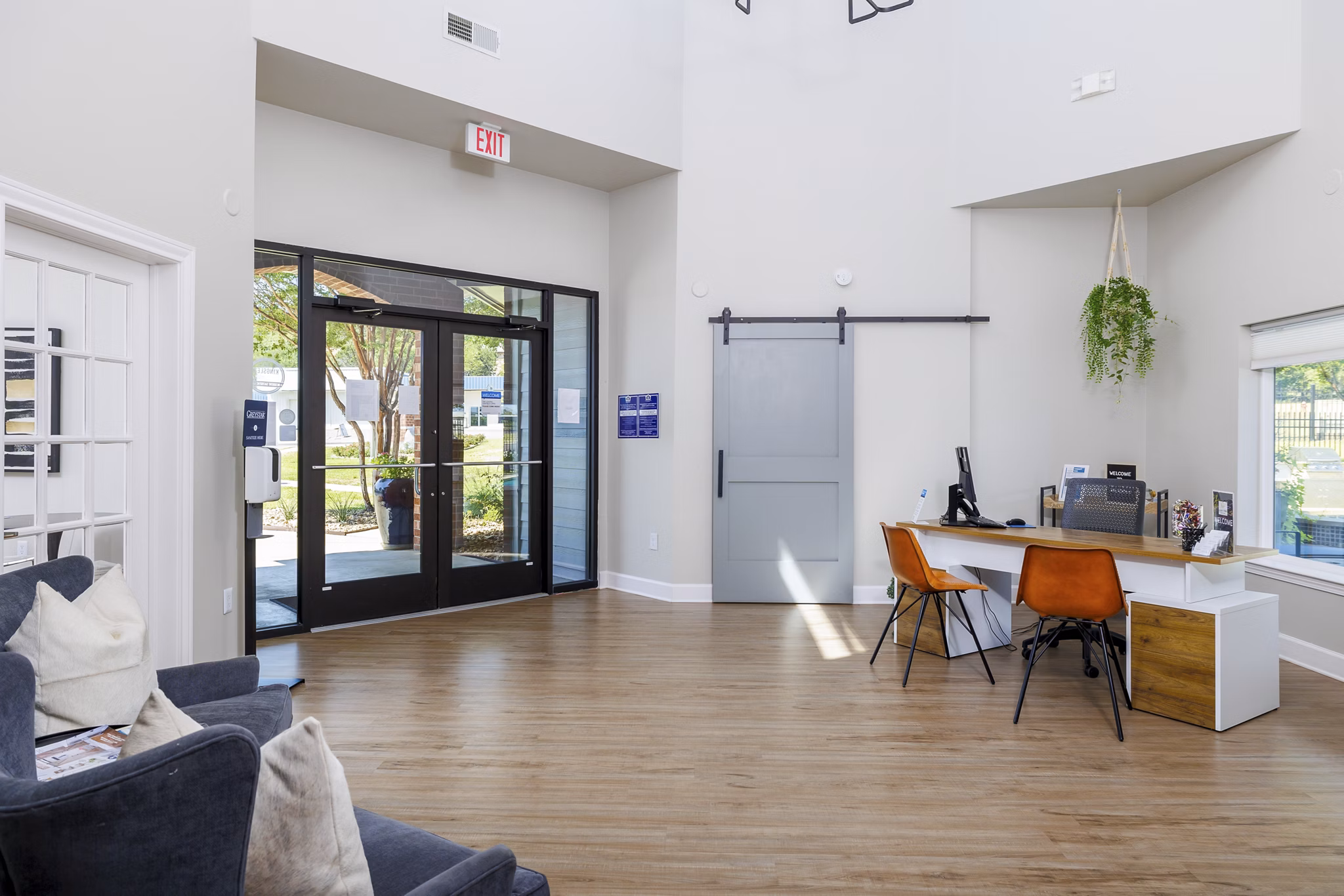 Clubhouse featuring modern design and cozy seating at Clear Creek Meadows Apartments