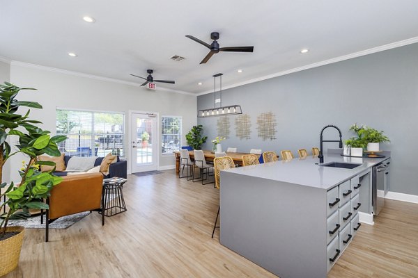 Clubhouse featuring modern decor and lounge spaces at Clear Creek Meadows Apartments