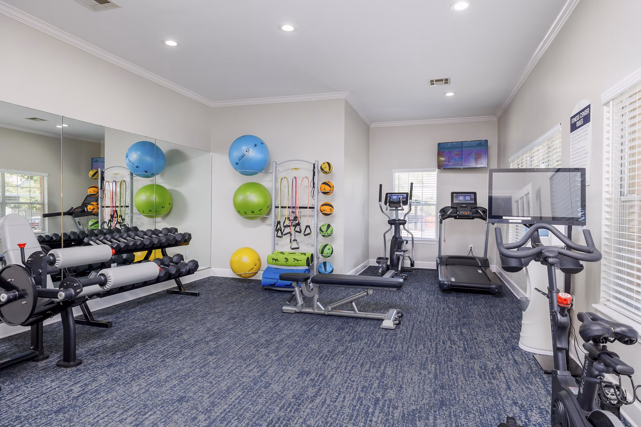 Fully-equipped fitness center at Clear Creek Meadows Apartments with modern gym equipment for a healthy lifestyle