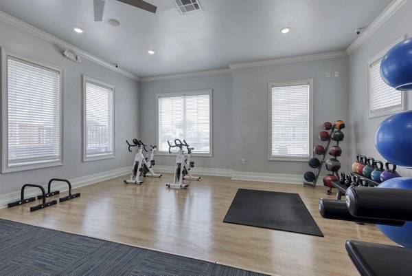 fitness center at South Bay Apartments 