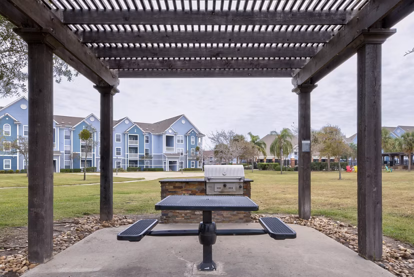 Outdoor grill area with sleek design at South Bay Apartments, perfect for social gatherings and barbecues
