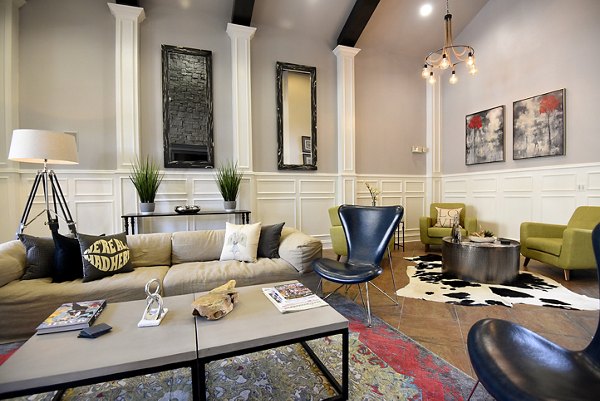Elegant clubhouse interior with plush seating at Avana Sugar Land Apartments