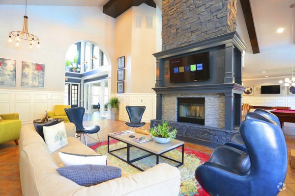 Modern clubhouse at Avana Sugar Land Apartments featuring sleek design and ample seating, ideal for social gatherings