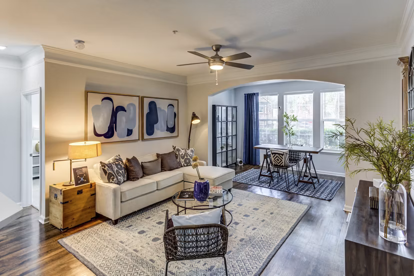 Living room showcasing modern sofas and natural light at Avana Sugar Land Apartments