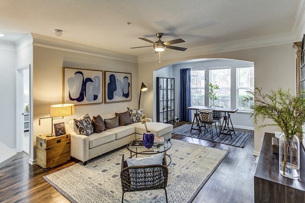 Living room showcasing modern sofas and natural light at Avana Sugar Land Apartments