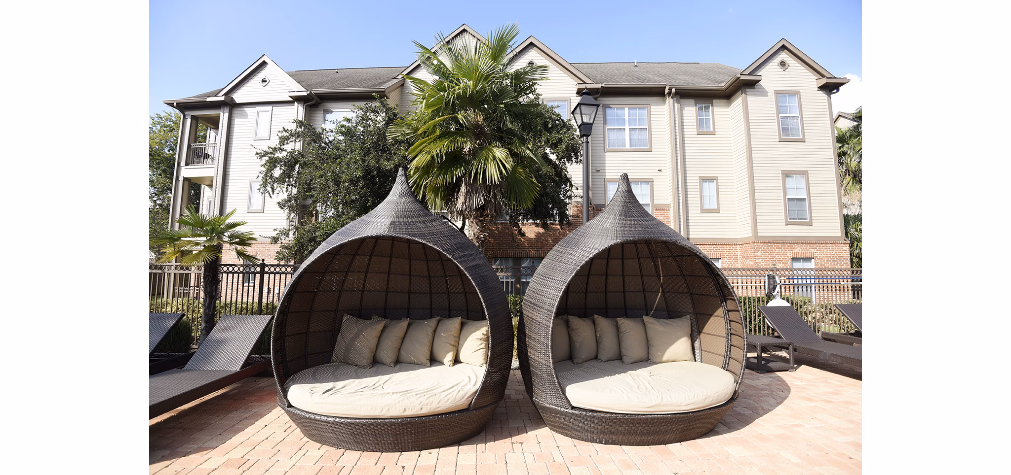 Scenic patio with stylish furniture at Avana Sugar Land Apartments offers tranquil outdoor living space