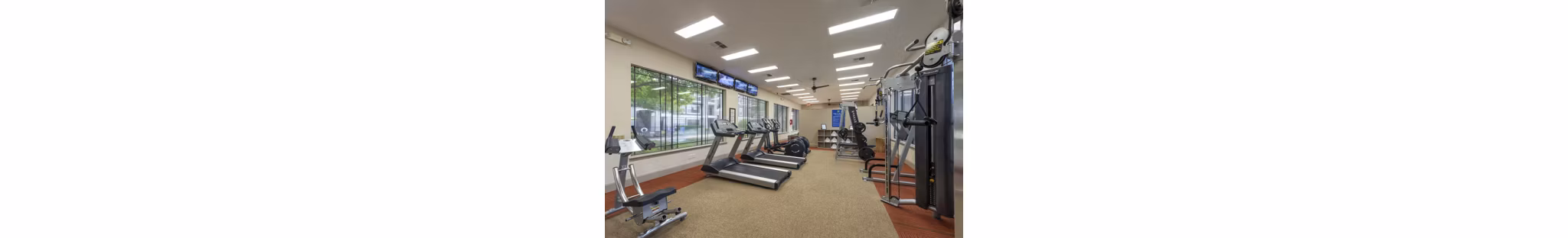 State-of-the-art fitness center with modern equipment at West End Apartments for a healthy lifestyle