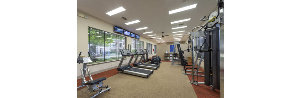 State-of-the-art fitness center with modern equipment at West End Apartments for a healthy lifestyle