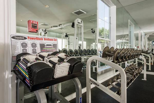 fitness center at The Saulet Apartments
