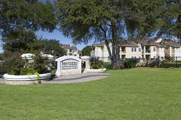 Terrazzo Apartments: Modern signage and of luxury apartments in vibrant neighborhood