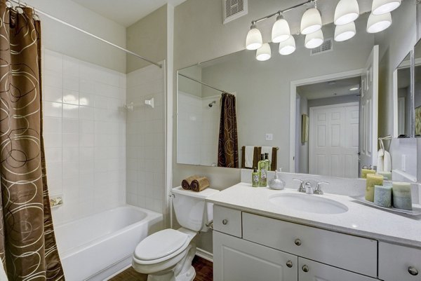 Bathroom featuring modern fixtures and sleek design at Terrazzo Apartments, luxury living by Greystar