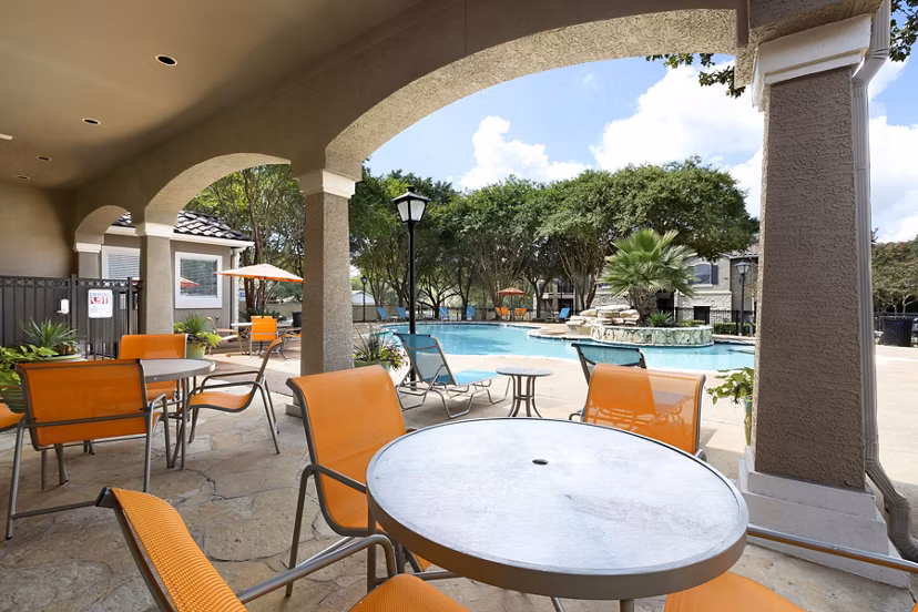 Chic outdoor patio with stylish seating at Terrazzo Apartments
