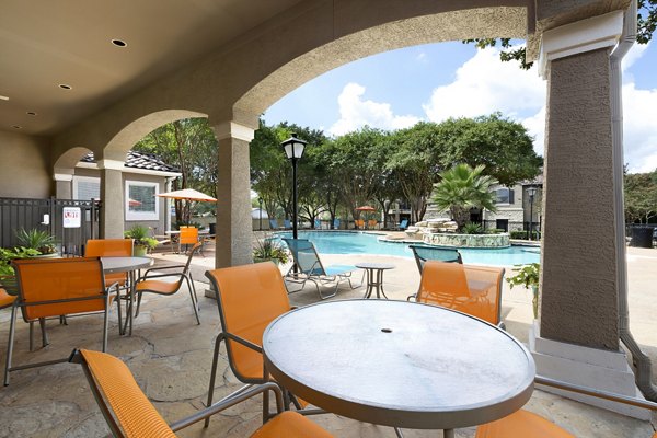 Chic outdoor patio with stylish seating at Terrazzo Apartments