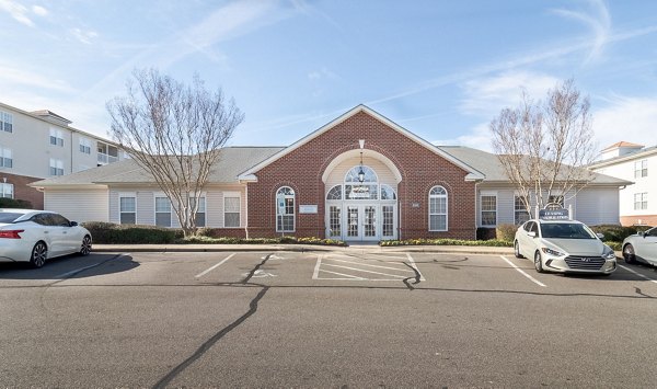 Patriots Pointe Apartments: Elegant brick luxury apartments in a serene neighborhood