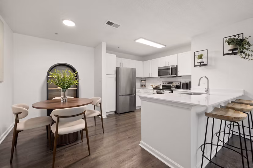 Modern kitchen with stainless steel appliances at Patriots Pointe Apartments