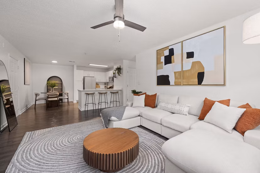 Cozy living room with modern decor at Patriots Pointe Apartments luxury by Greystar