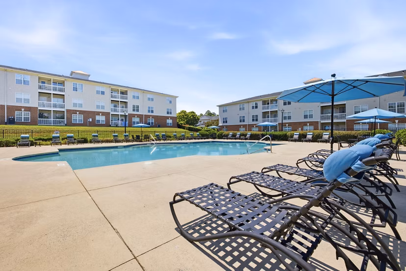 Luxurious swimming pool at Patriots Pointe Apartments offering refined relaxation