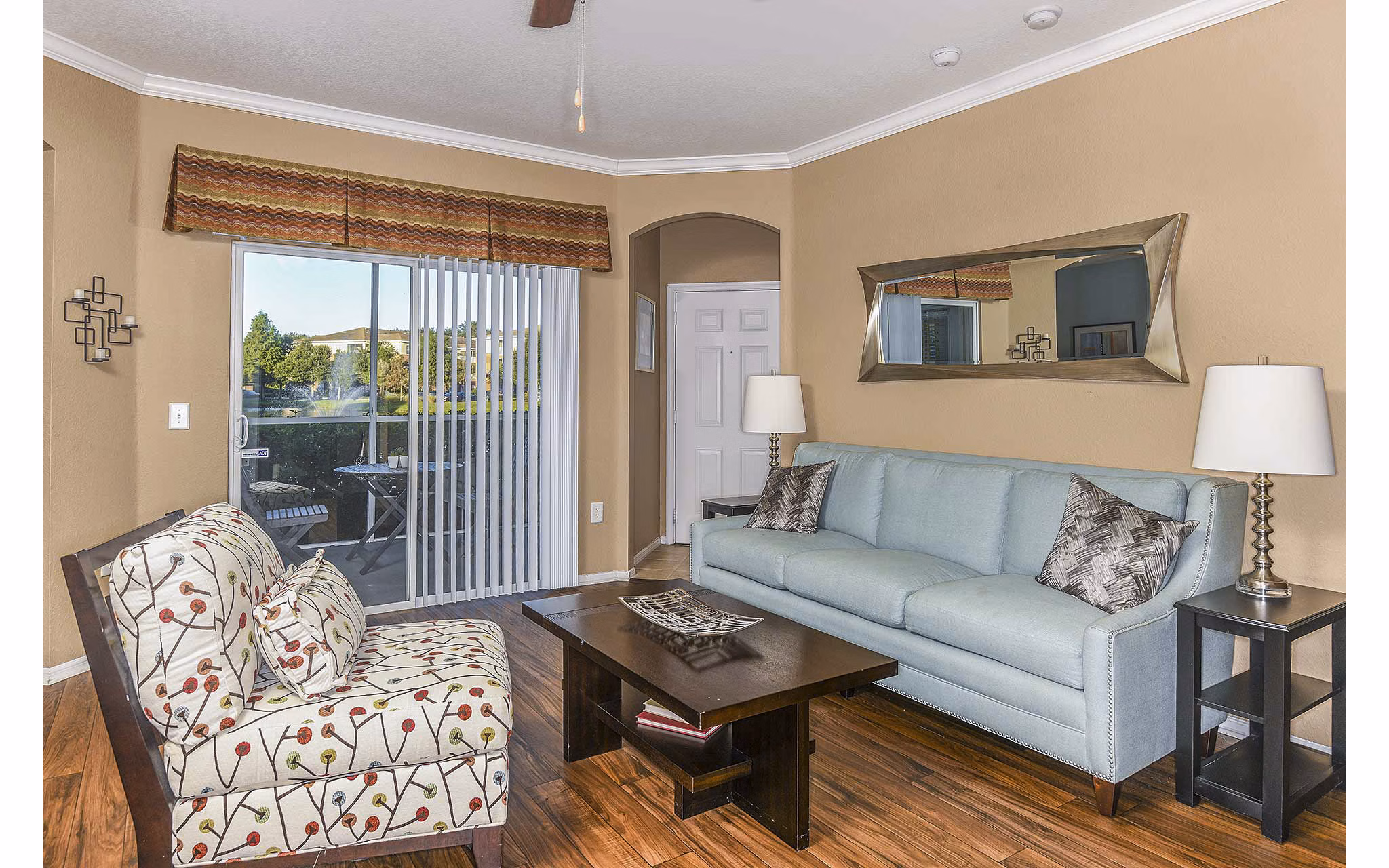 Spacious living room with modern furnishings at Villas at Gateway Apartments