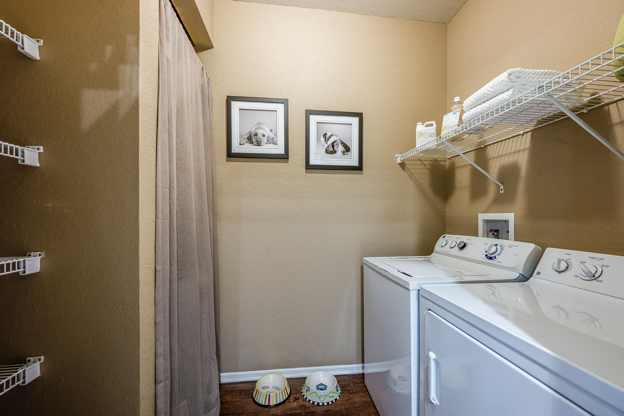 Laundry room at Villas At Gateway Apartments