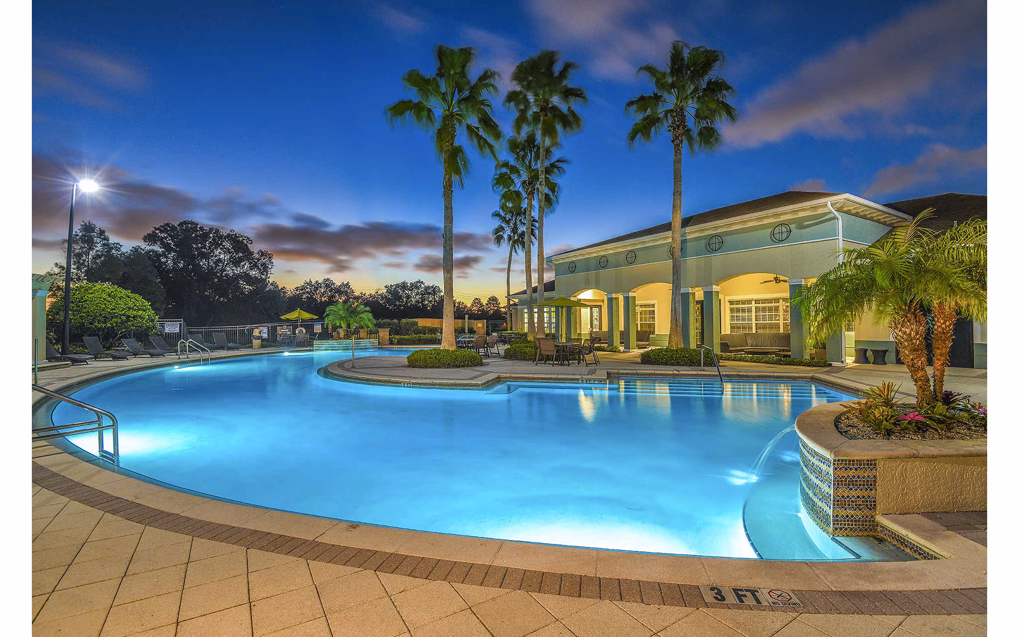 Crystal-clear pool at Villas at Gateway Apartments, perfect for relaxation and outdoor enjoyment