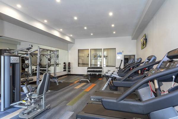 fitness center at 7166 at Belmar Apartments