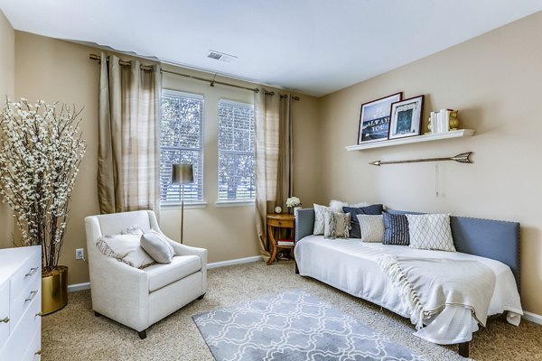 Bedroom featuring elegant design with plush bedding at Waterford Lone Tree Apartments