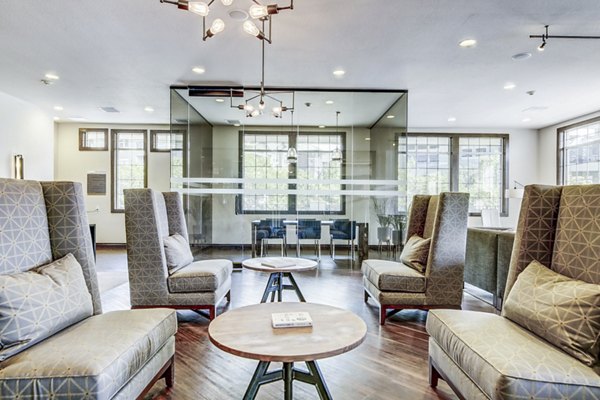 Modern clubhouse lobby with stylish seating at Waterford Lone Tree Apartments, featuring luxurious design and welcoming ambiance