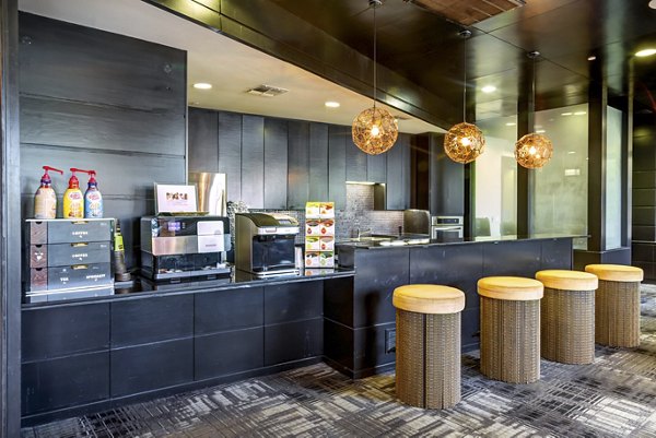 Clubhouse featuring modern design and seating at The Westheimer Apartments, luxury living in Houston