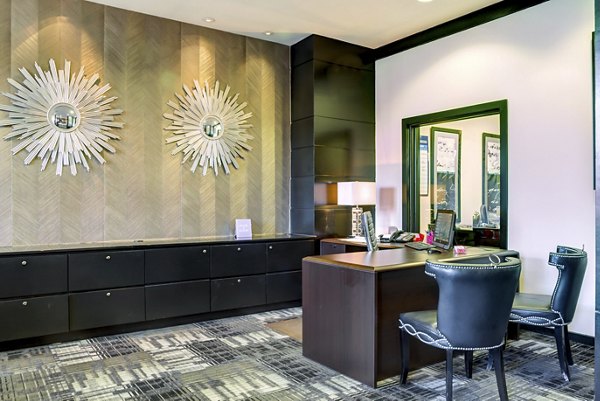 Business center with sleek workstations at The Westheimer Apartments, luxury Greystar property in a vibrant Houston neighborhood