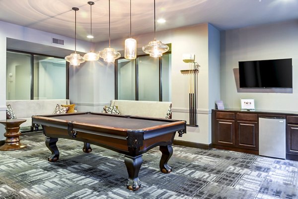 Clubhouse with modern design and seating areas at The Westheimer Apartments in Houston's Montrose District