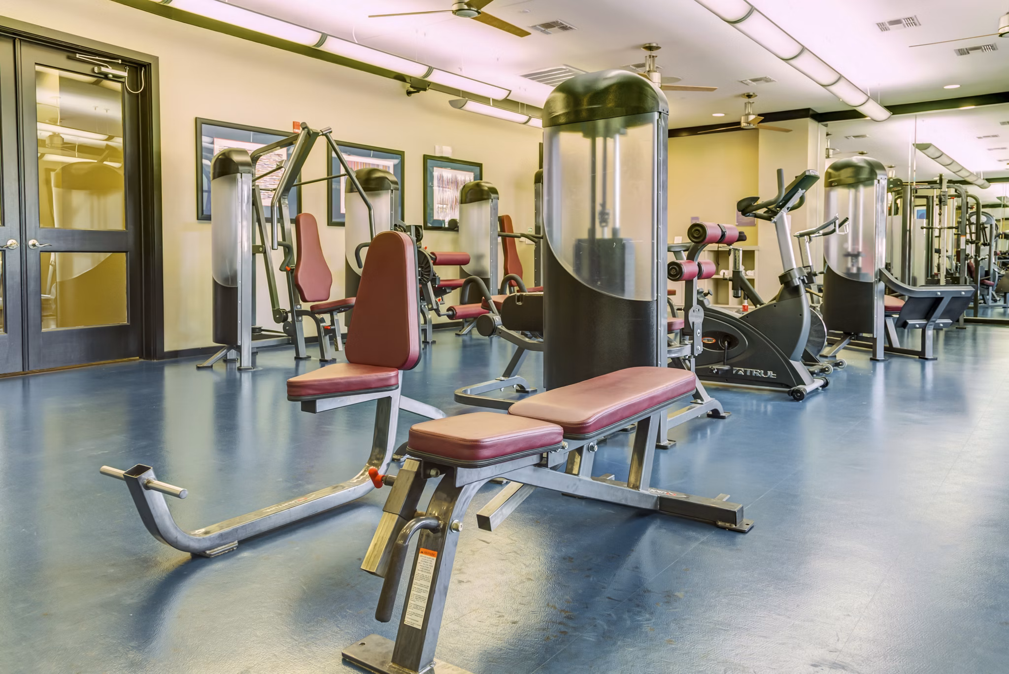 Fitness center at The Westheimer Apartments: Comprehensive gym with modern equipment for residents