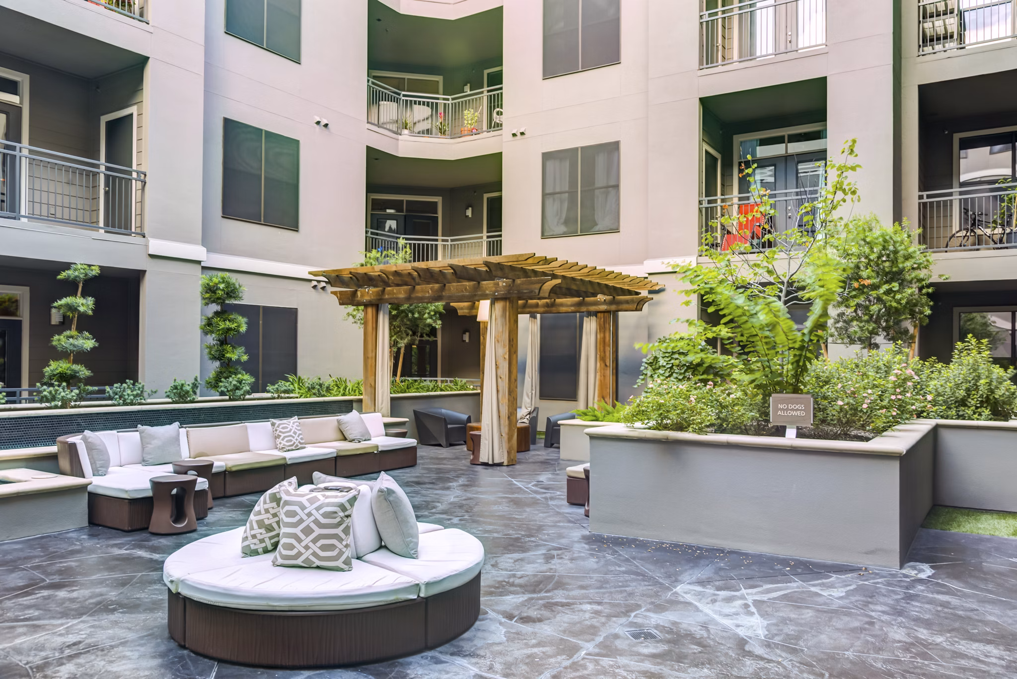Modern outdoor patio with stylish seating at The Westheimer Apartments in Houston