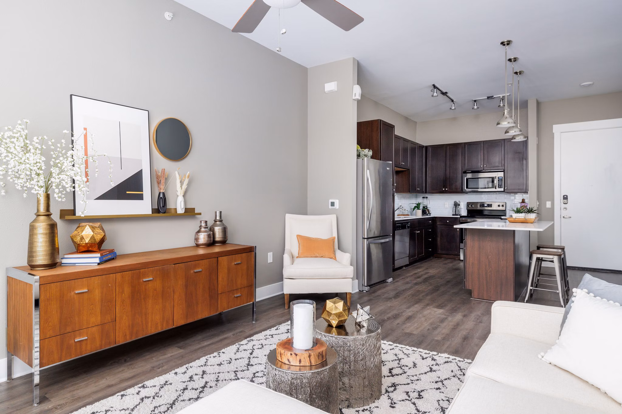 Modern living room with sleek furniture at Haus 5350 Apartments designed for luxury living