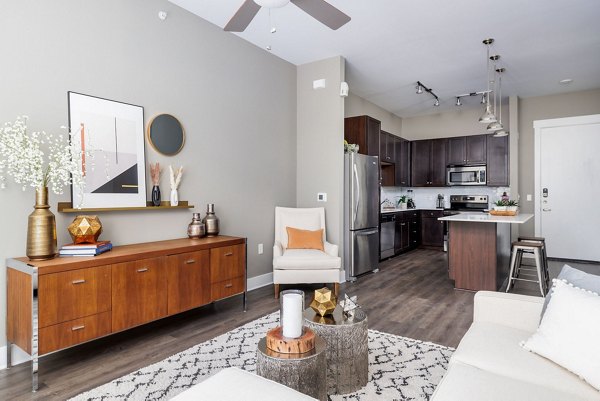 Modern living room with sleek furniture at Haus 5350 Apartments designed for luxury living