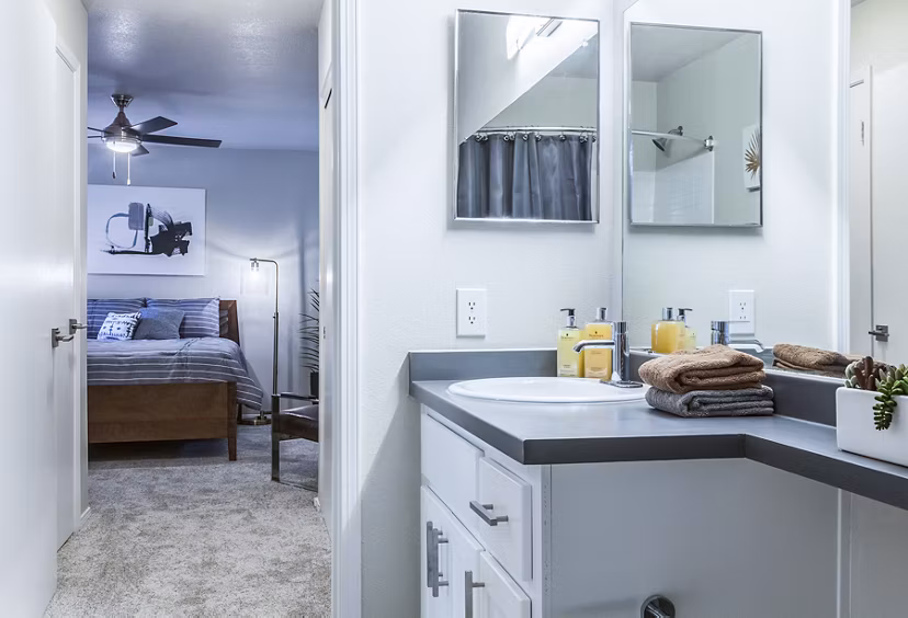Modern bathroom with sleek fixtures at OTTAVO Apartments, offering luxury living