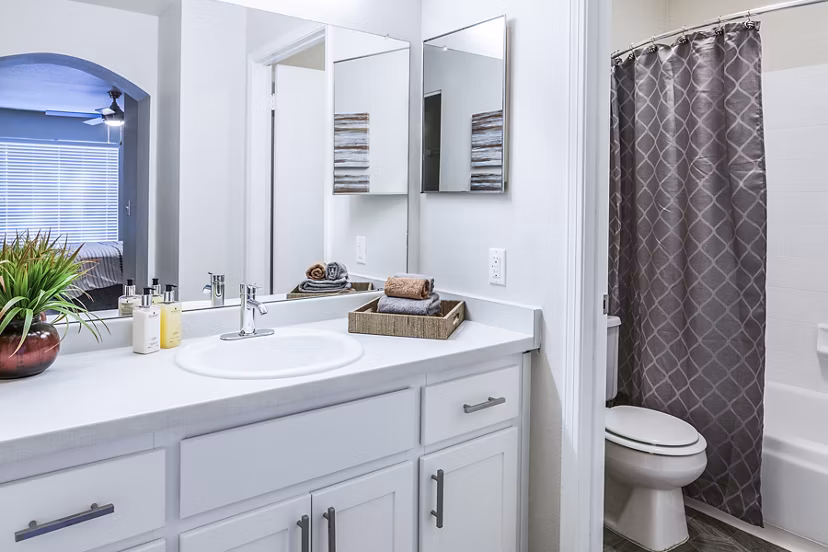 Sleek bathroom with modern fixtures at OTTAVO Apartments