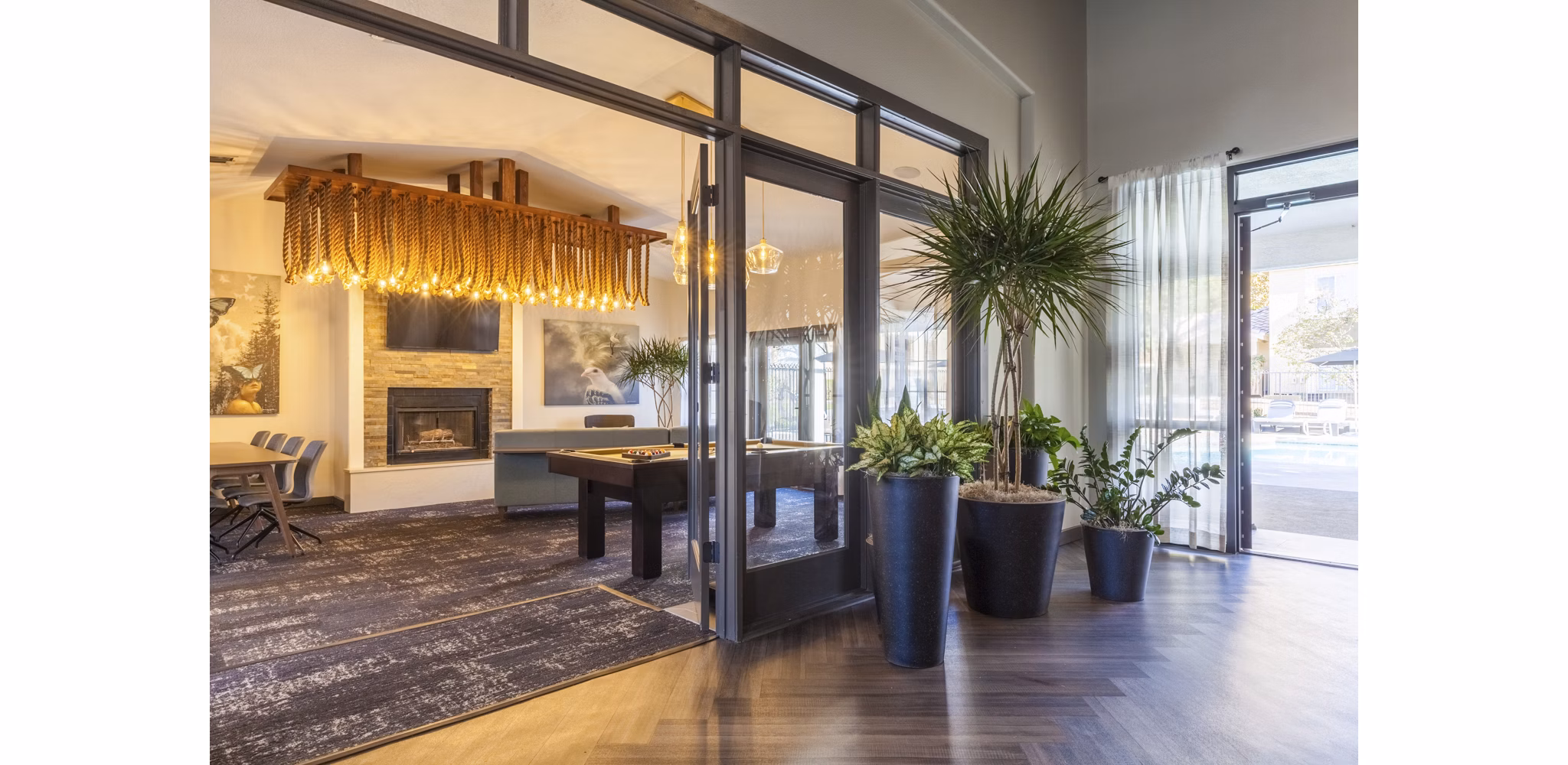 Clubhouse lounge featuring modern seating and decor at Ottavo Apartments, ideal for social gatherings and relaxation