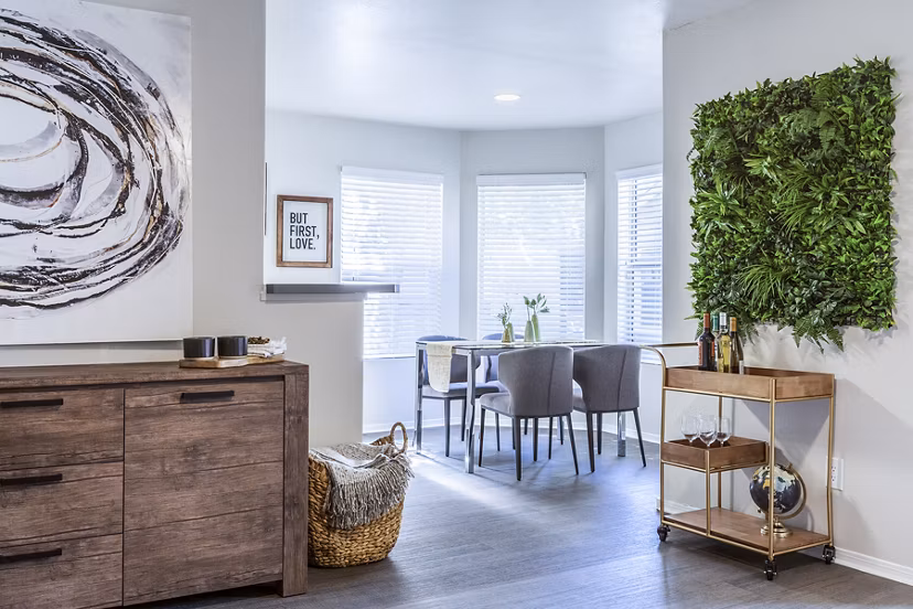 Dining room with sleek furniture and modern lighting at OTTAVO Apartments luxury community, perfect for stylish living