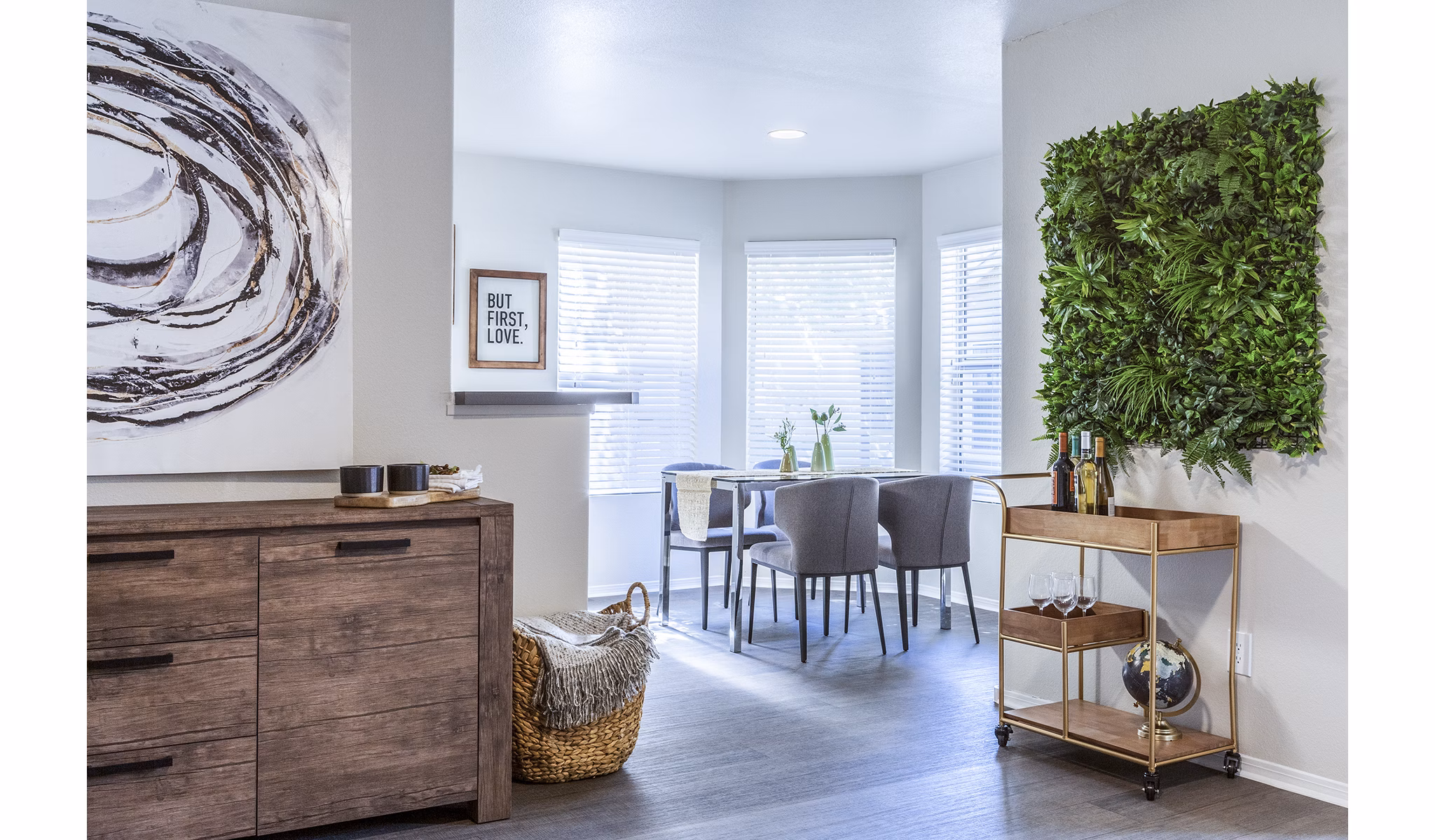 Dining room with sleek furniture and modern lighting at OTTAVO Apartments luxury community, perfect for stylish living