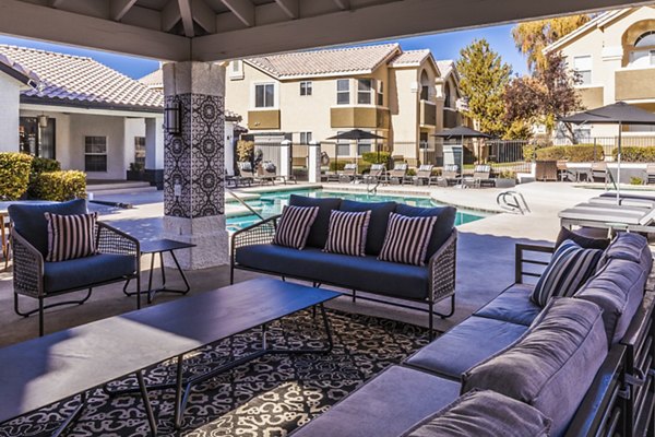 Expansive patio with cozy seating at Ottavo Apartments, offering outdoor relaxation and luxurious living experiences