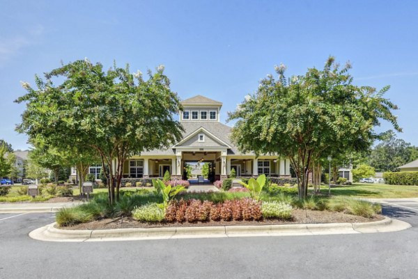 Garrett West Apartments: Elegant design featuring lush landscaping in Durham