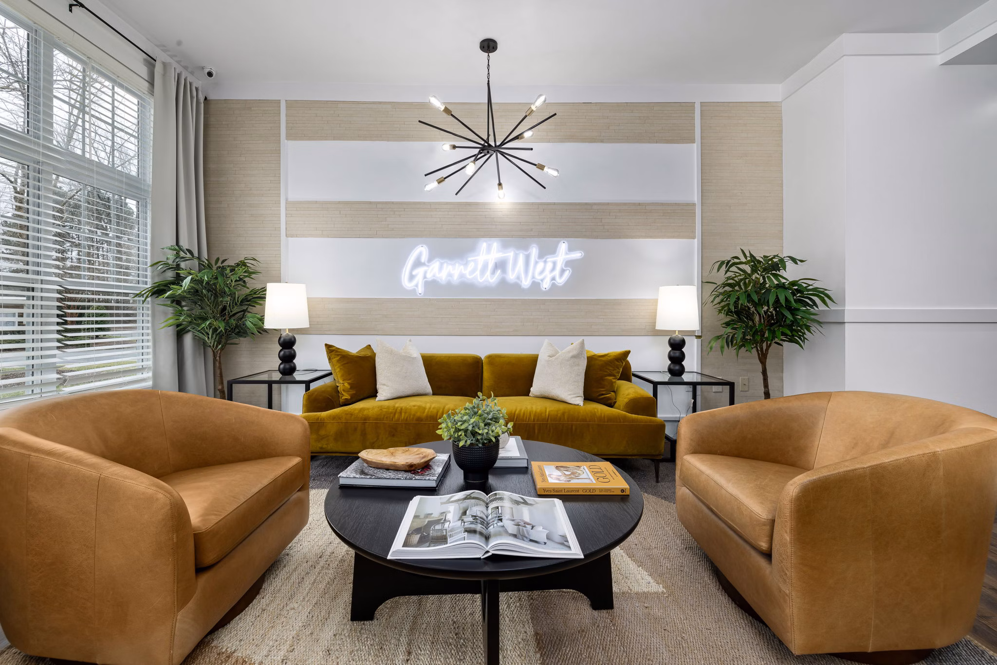 Stylish clubhouse with modern furnishings at Garrett West Apartments