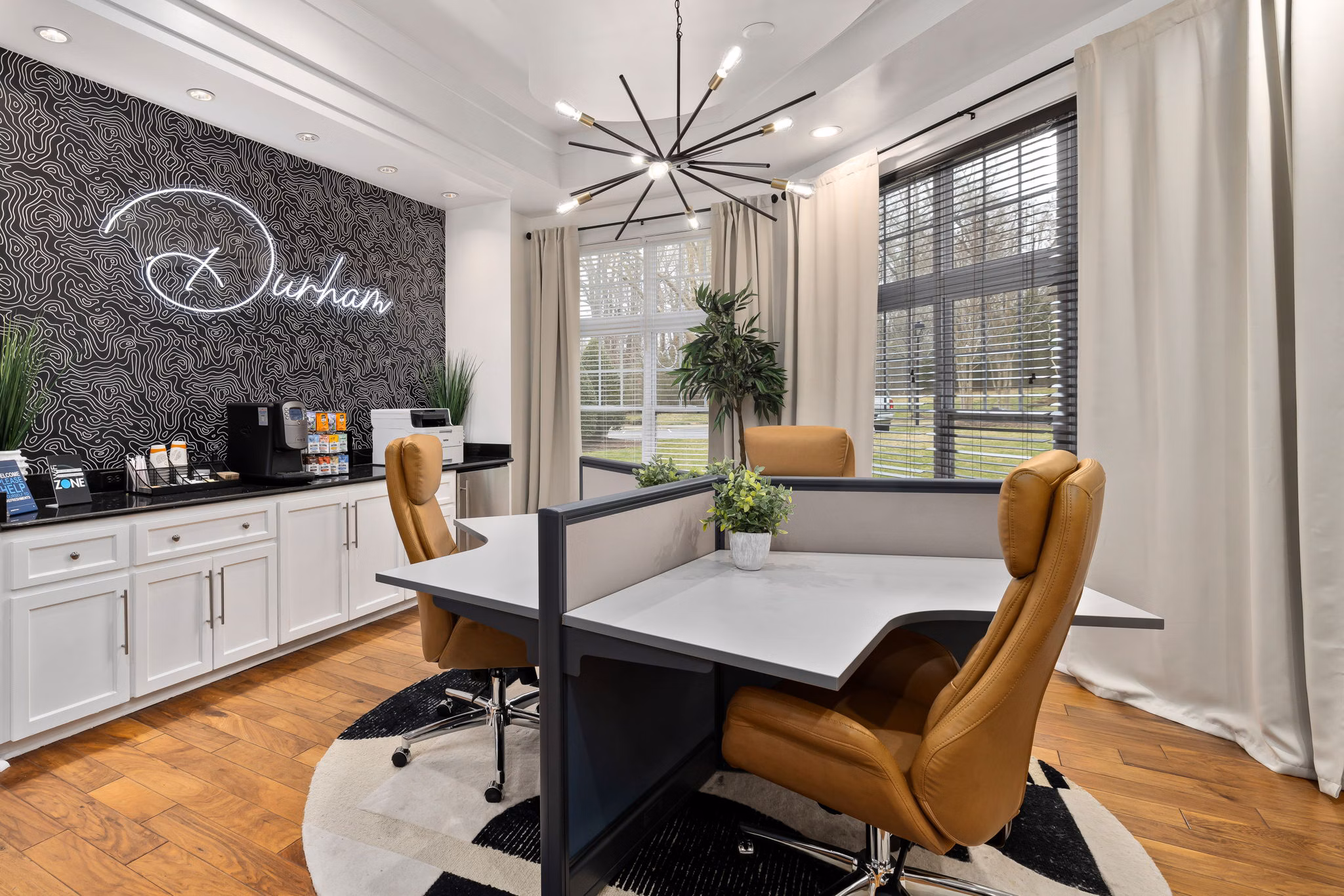 Clubhouse featuring modern design and cozy seating areas at Garrett West Apartments in Durham, NC for luxury living experiences