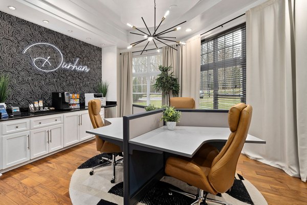 Clubhouse featuring modern design and cozy seating areas at Garrett West Apartments in Durham, NC for luxury living experiences