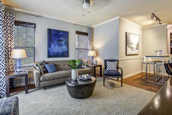 Spacious living room with modern decor at Garrett West Apartments in Durham, ideal for luxury apartment living