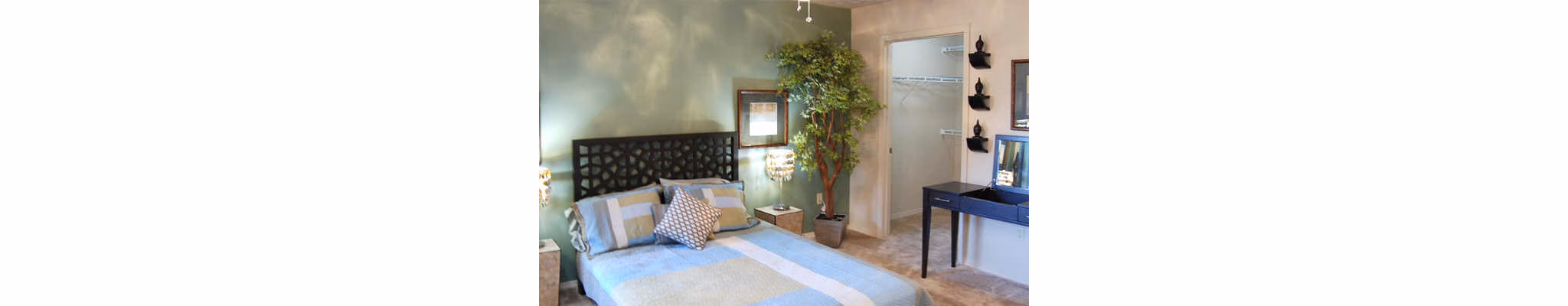 Comfortable bedroom with modern decor at Esteban Park Apartments