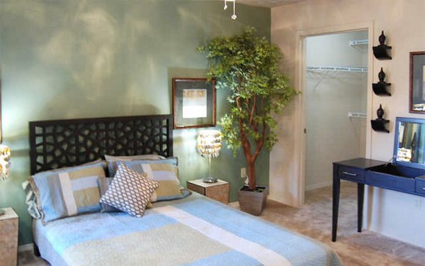 Comfortable bedroom with modern decor at Esteban Park Apartments