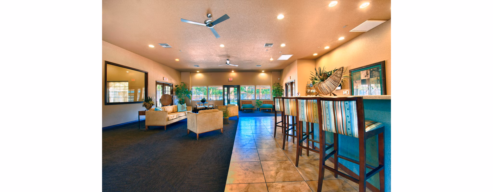 Modern clubhouse with contemporary seating and entertainment area at Esteban Park Apartments, a luxurious Greystar property