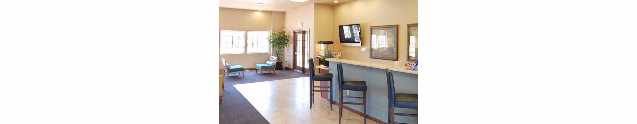 Clubhouse featuring modern design and vibrant community space at Esteban Park Apartments